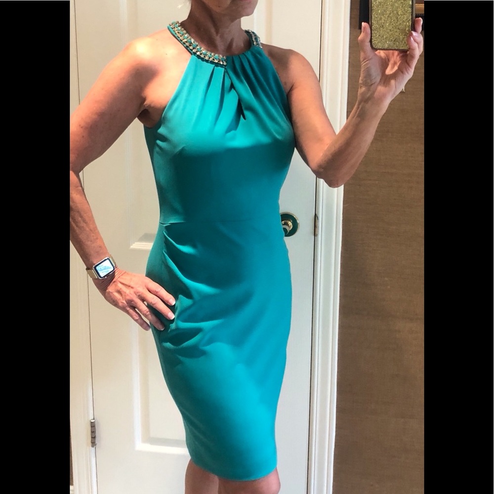 Stunning Emerald green dress with embellished neck